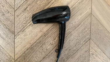 Boots 1500W Travel Dryer review side of hairdryer with handle unfolded
