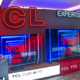 The TCL C8K and TCL X11K TVs on display at TCL's Expert Meet Experts event in Warsaw